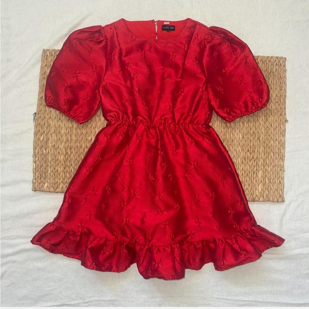 Red Sister Jane dress with heart cut out